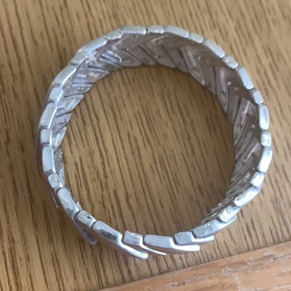 Silver, one size, gently used bracelet. Stretchy and will fit most wrists. - Picture 2 of 3